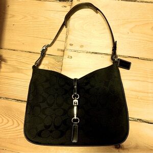 Coach bag with silver clip class. Black.